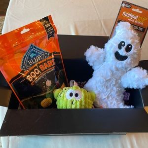 Box of brand new Halloween toys and treats for dogs!